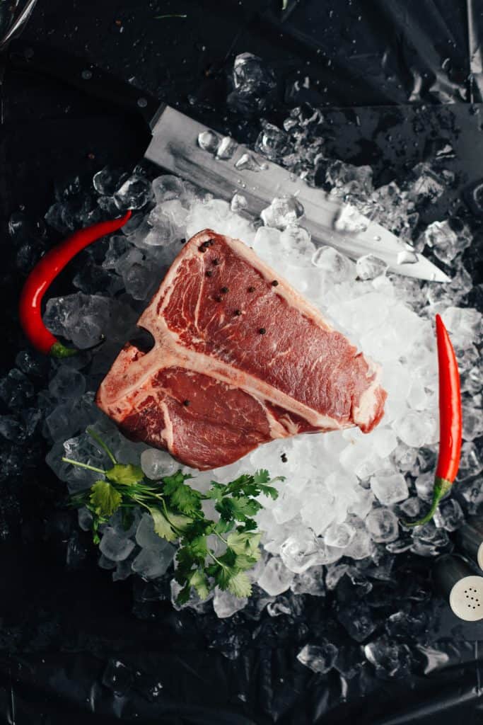 Raw Steak on ice - real food